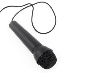 Microphone with cord isolated on white background, copy space for text	