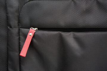 Close up photo of suitcase zipper            