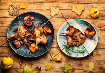 Quail grilled with quince