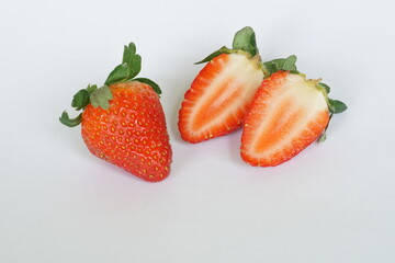 red strawberries on the white background