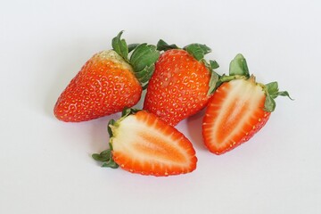 red strawberries on the white background