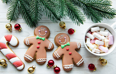 Christmas background with cocoa and gingerbread cookies.