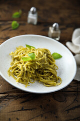 Traditional spaghetti with pesto sauce