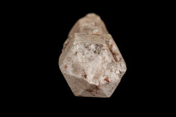 Macro of a stone, a scepter-like quartz mineral on a black background