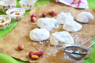 Manna and Salwa sweets are traditional Arabic sweets consisting of egg whites and pistachios on a baking sheet