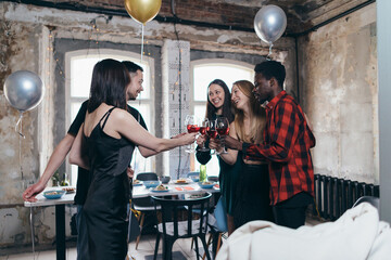 Group of friends celebrating in the bar.
