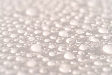 Lots of drops on a white background.