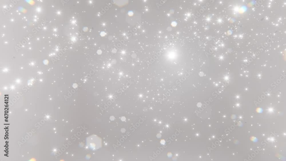 Sticker abstract motion background shining silver particles. shimmering glittering particles with bokeh. new