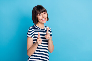 Photo of funny brunette millennial lady point you wear striped t-shirt isolated on blue background