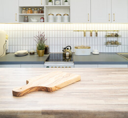 Fototapeta na wymiar Wood table top on blur kitchen room