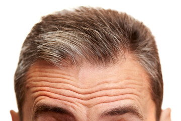 Fototapeta premium Close-up of a mature men forehead with wrinkles.