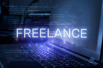 Freelance inscription against laptop and code background. Technology concept.