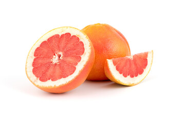 Fresh tasty grapefruit, whole and cut exotic fruit, citrus fruits, healthy fruit, close-up isolated