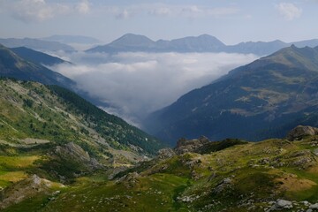 Obraz premium Beautiful mountain view above clouds during hiking on peak Djeravica (Gjerovica) - the highest peak of Kosovo. Albanian Alps, Peaks of Balkans