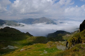 Beautiful mountain view above clouds during hiking on peak Djeravica (Gjerovica) - the highest peak of Kosovo. Albanian Alps, Peaks of Balkans