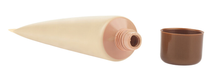 Tube with tonal cream isolated on white background.