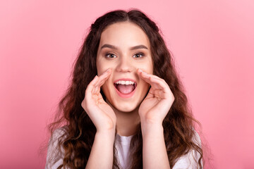 Photo of young excited girl arms near mouth scream announcement advert isolated over pink color background