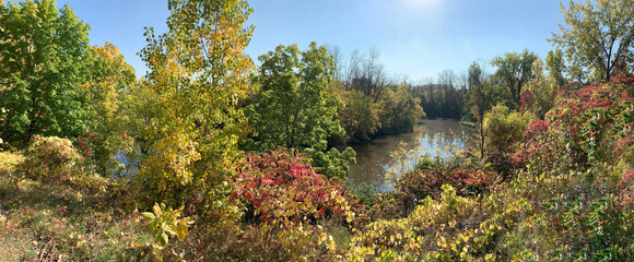 Panoramic view in autumn along the Turtle River in Delson, Quebec