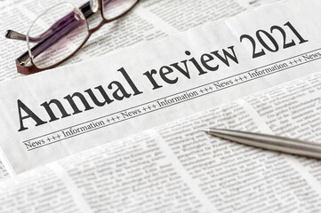 A newspaper with the headline Annual review 2021
