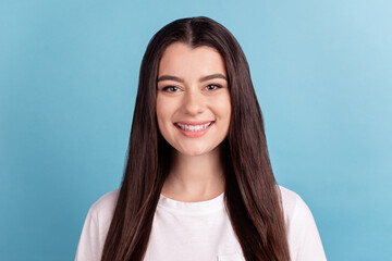 Photo of young cheerful lady good mood toothy smile whitening cavity protection isolated over blue...