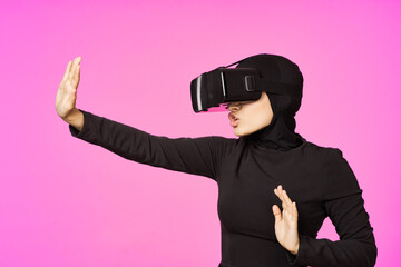 muslim woman wearing virtual reality glasses entertainment technology device