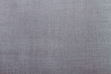 Grey fabric background with interlacing threads. Copy Space