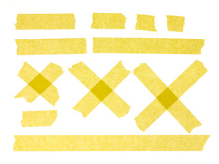 Strips of yellow masking tape on white background. Set of adhesive tape strips and crosses....