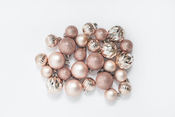 Christmas decorative balls on a white background. Top view, flat lay.