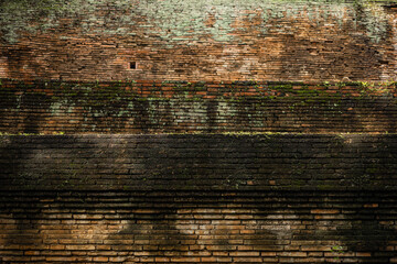 Obraz premium old ancient brick wall grunge dirty with moss
