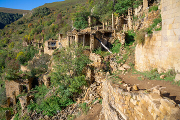 Fototapeta premium On the ruins of the abandoned mountain village of Gamsutl. Republic of Dagestan, Russia