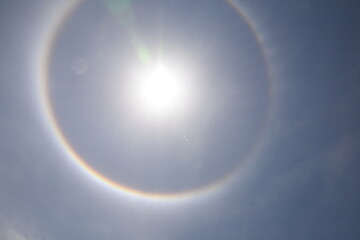 Beautiful view of Sun Halo over Bangalore city ,during summer when sun is coming out one may notice a ring, or halo, around the sun. This unusual sight is caused by cirrus clouds.