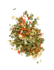 pile of dehydrated vegetables, food seasoning on white background, top view closeup