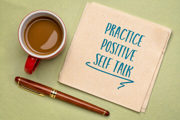 practice positive self talk - inspirational advice on a napkin with a cup of coffee, positive...
