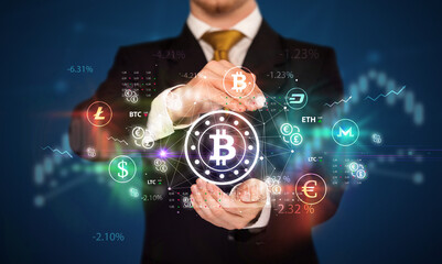 Businessman holding currency symbols concept