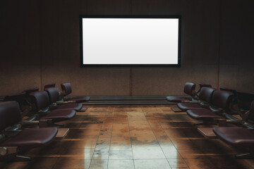 An empty white plasma tv template in a waiting room of a modern airport terminal; a mockup of a...