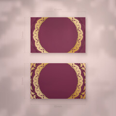 Burgundy business card template with mandala gold ornament for your brand.