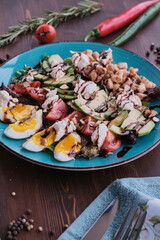 Vegetable salad with eggs and walnuts