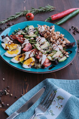 Vegetable salad with eggs and walnuts