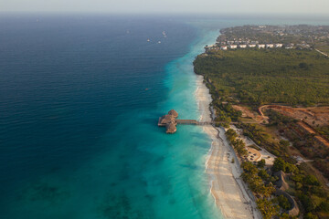 Tropical island of Zanzibar, Tanzania. Coastline, ocean and boats. Amazing nature and beautiful views