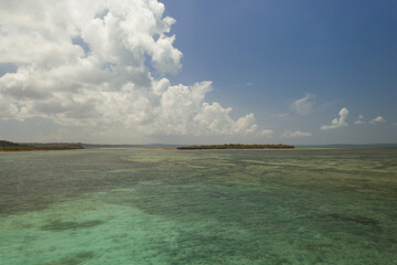 Tropical island of Zanzibar, Tanzania. Coastline, ocean and boats. Amazing nature and beautiful views