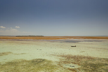 Tropical island of Zanzibar, Tanzania. Coastline, ocean and boats. Amazing nature and beautiful views
