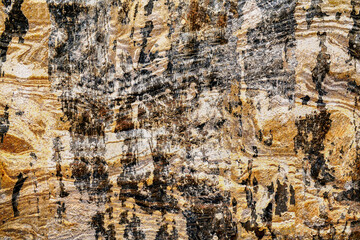 Rough wall texture background, black, brown, gold and white surface or cardboard of a box for packaging, for decoration designs and natural background concept