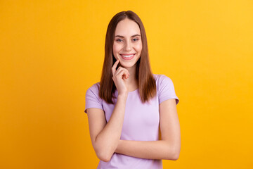 Photo of young attractive lady finger touch chin thoughtful plan isolated over yellow color background
