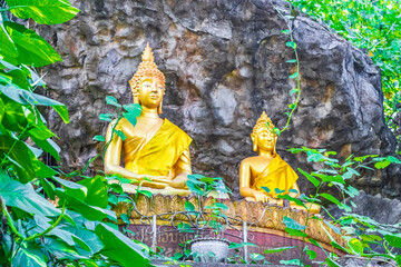 Golden buddha statues Phousi Hill Wat Chom Si Luang Prabang.