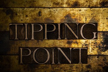 Tipping Point text message on textured grunge copper and vintage gold background