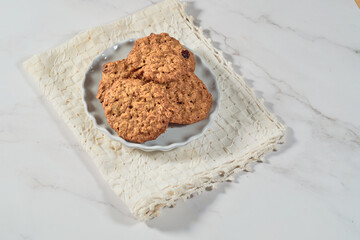 Homemade oatmeal cookies in a traditional way, healthy desserts.
