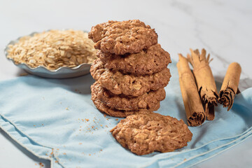 Stack of oatmeal cookies with dates. Healthy dessert concept.