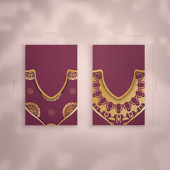 Burgundy business card with luxurious gold pattern for your personality.