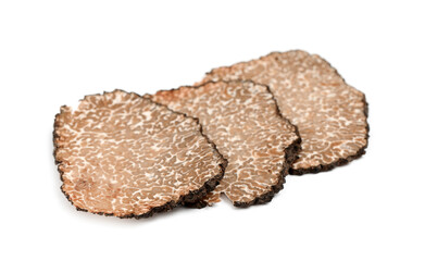 Slices of black truffle isolated on white