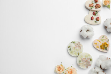 Composition with scented sachets on white  background, top view